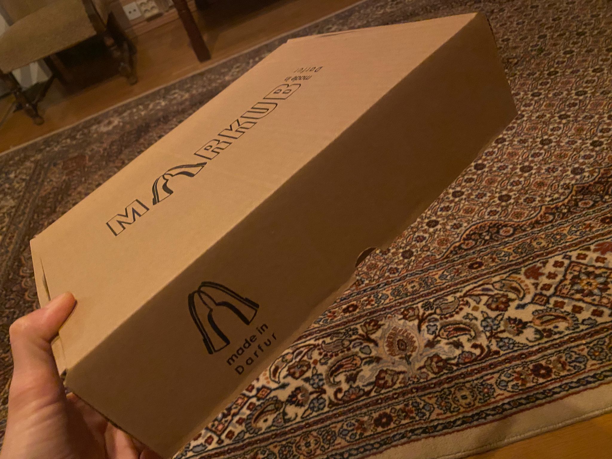 The original collection’s branded shoe box