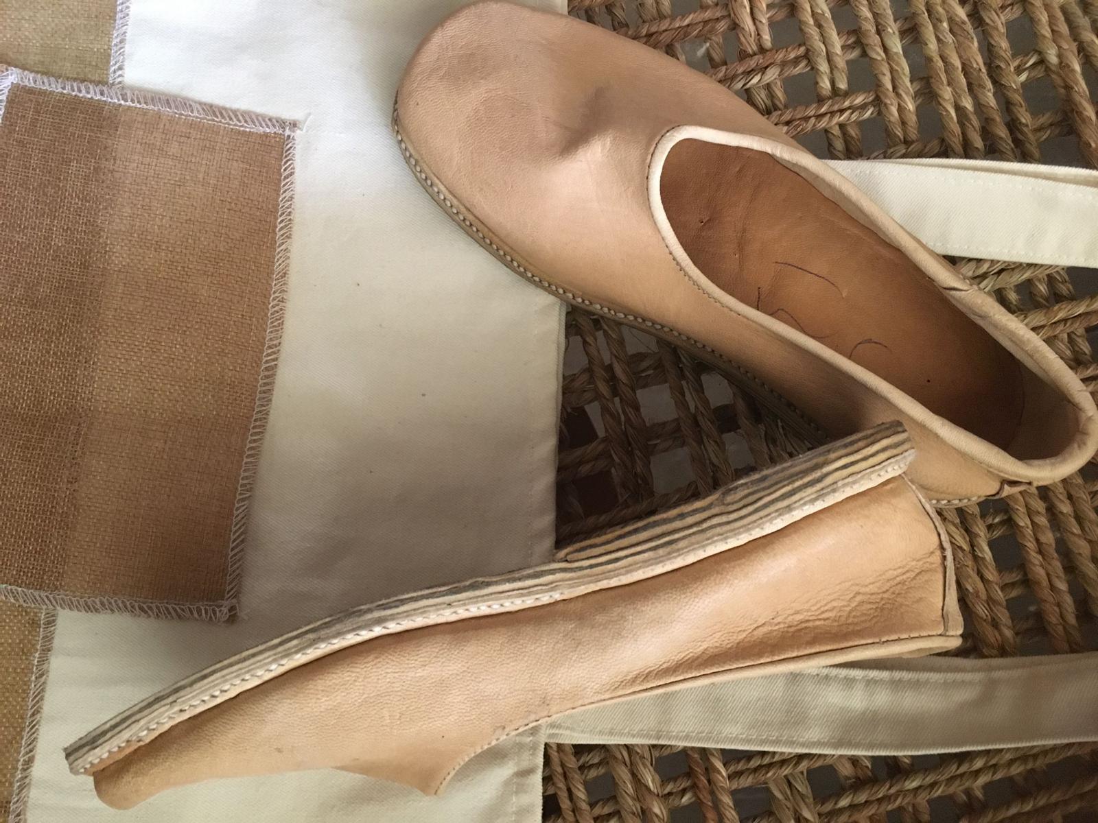 Close view of the original layered sole and edge stitching